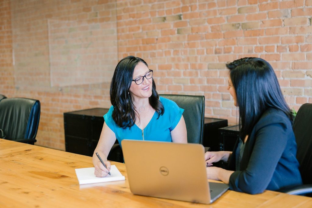 Professional reviewing notes in a quiet modern office