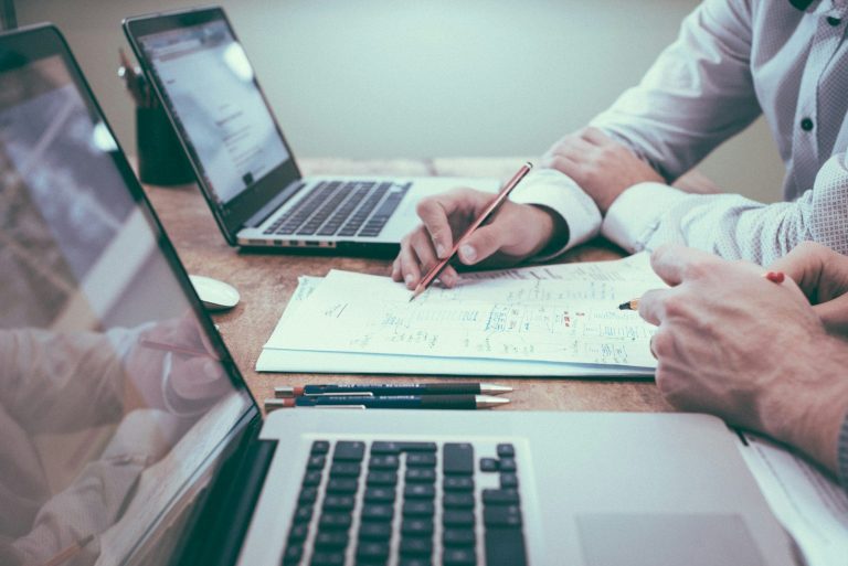 Business professional planning growth strategy at a desk