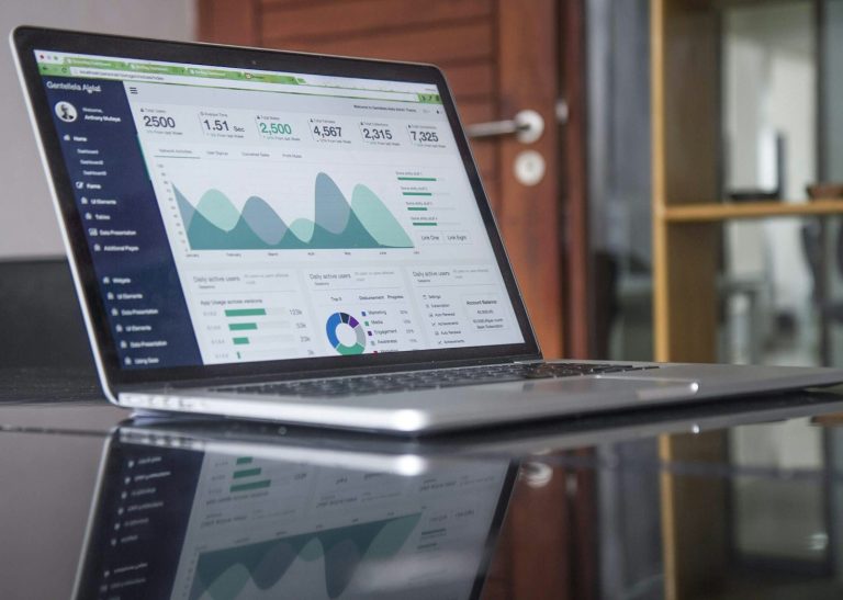 Analyst reviewing website analytics on a computer screen